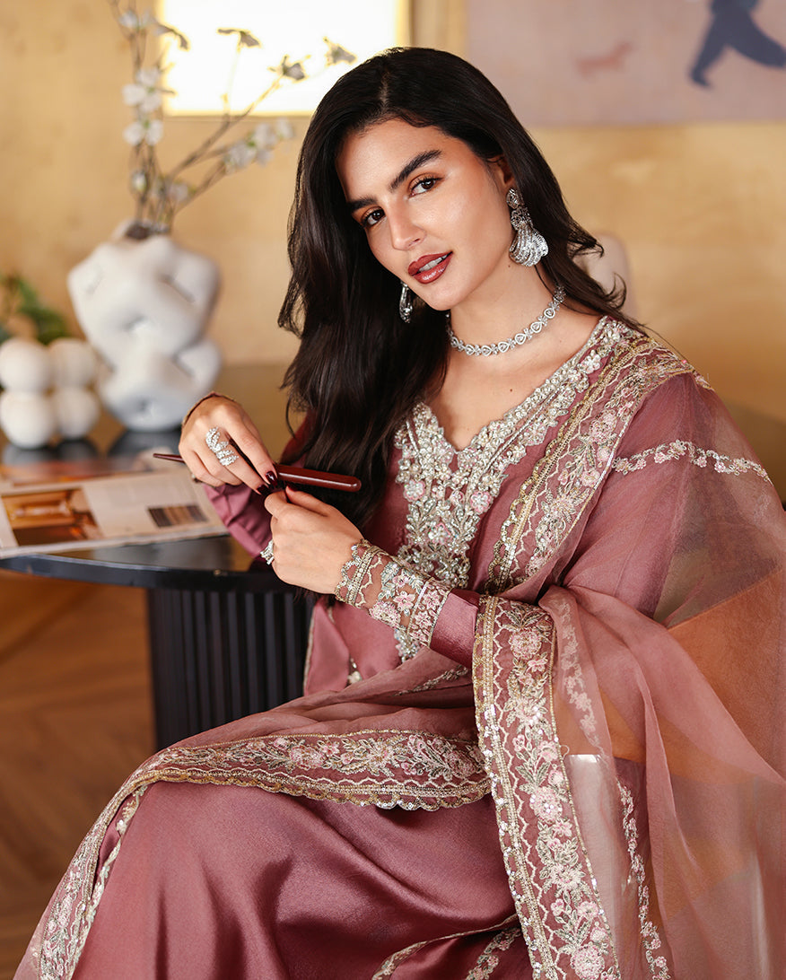 Mushq Rowa deep mauve formal suit — seated hem detail, design reference