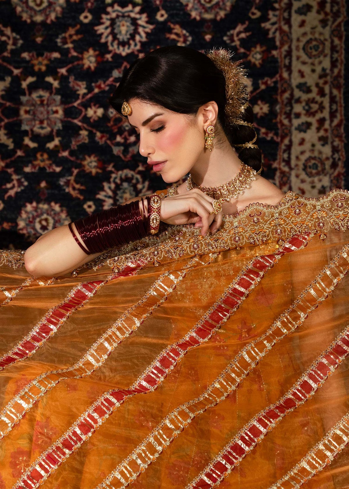Mehr, made by MAIRAZ — rust pishwas, dupatta embroidery and laser-effect border detail