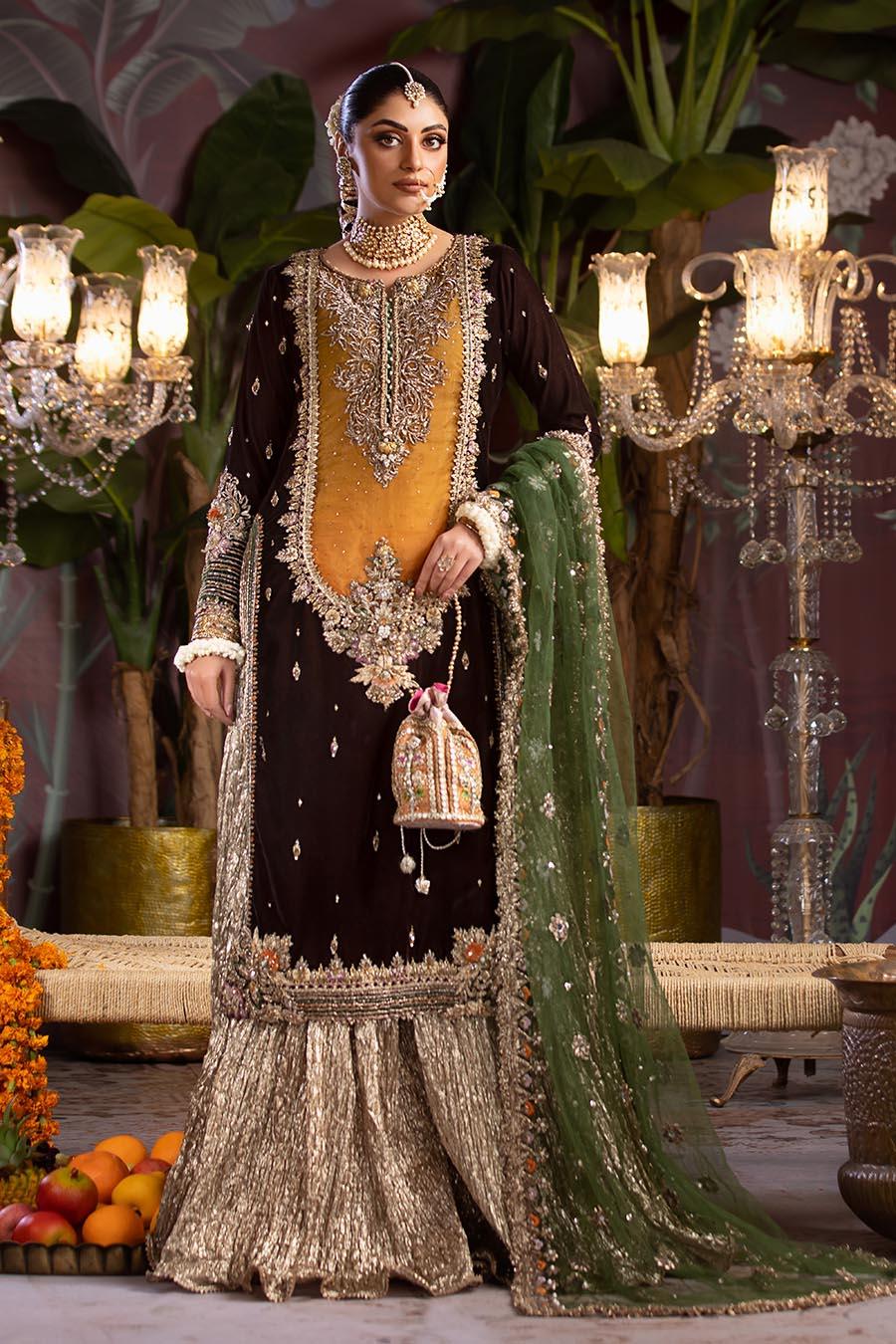 P-265, made by MAIRAZ — full-length front view of the dark velvet shirt, mustard panel, crushed sharara and green dupatta
