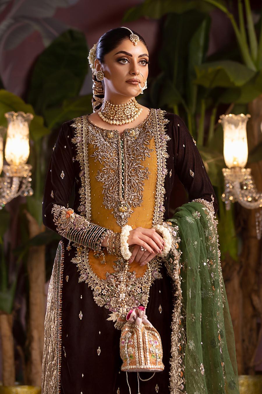 P-265, made by MAIRAZ — front detail view showing the neckline, sleeve embroidery and hem panel