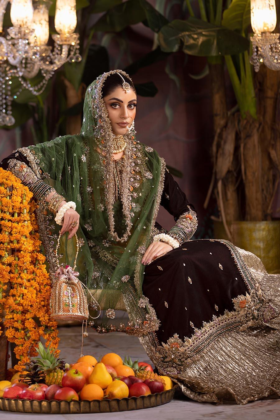 P-265, made by MAIRAZ — seated view showing the net dupatta draped over the head and shoulders