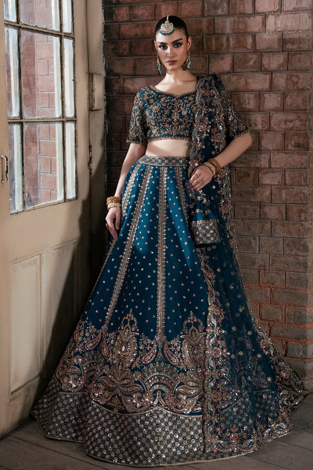 Tabassum, made by MAIRAZ — deep teal lehenga choli, full-length front view