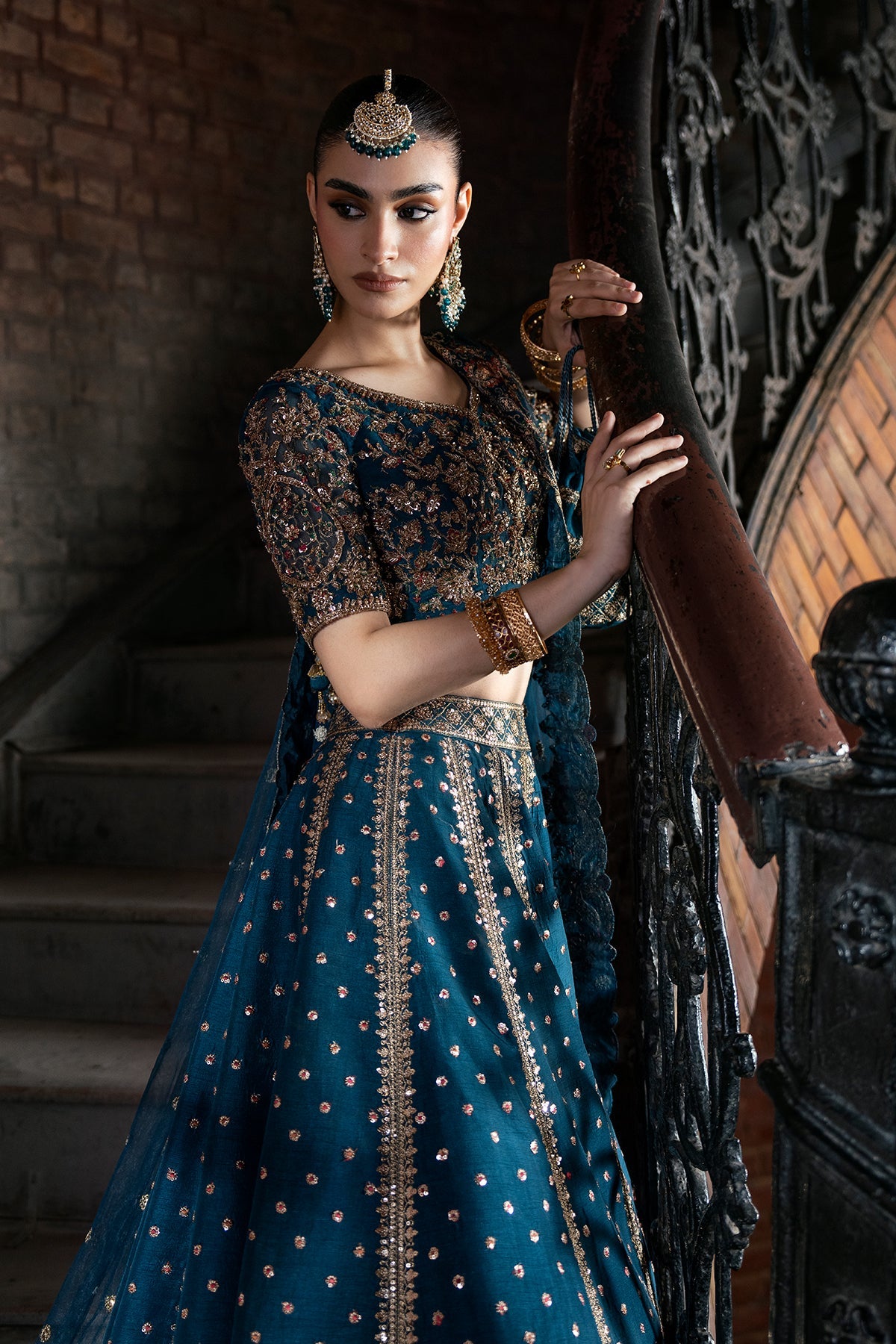 Tabassum, made by MAIRAZ — deep teal lehenga choli, blouse and sleeve embroidery detail