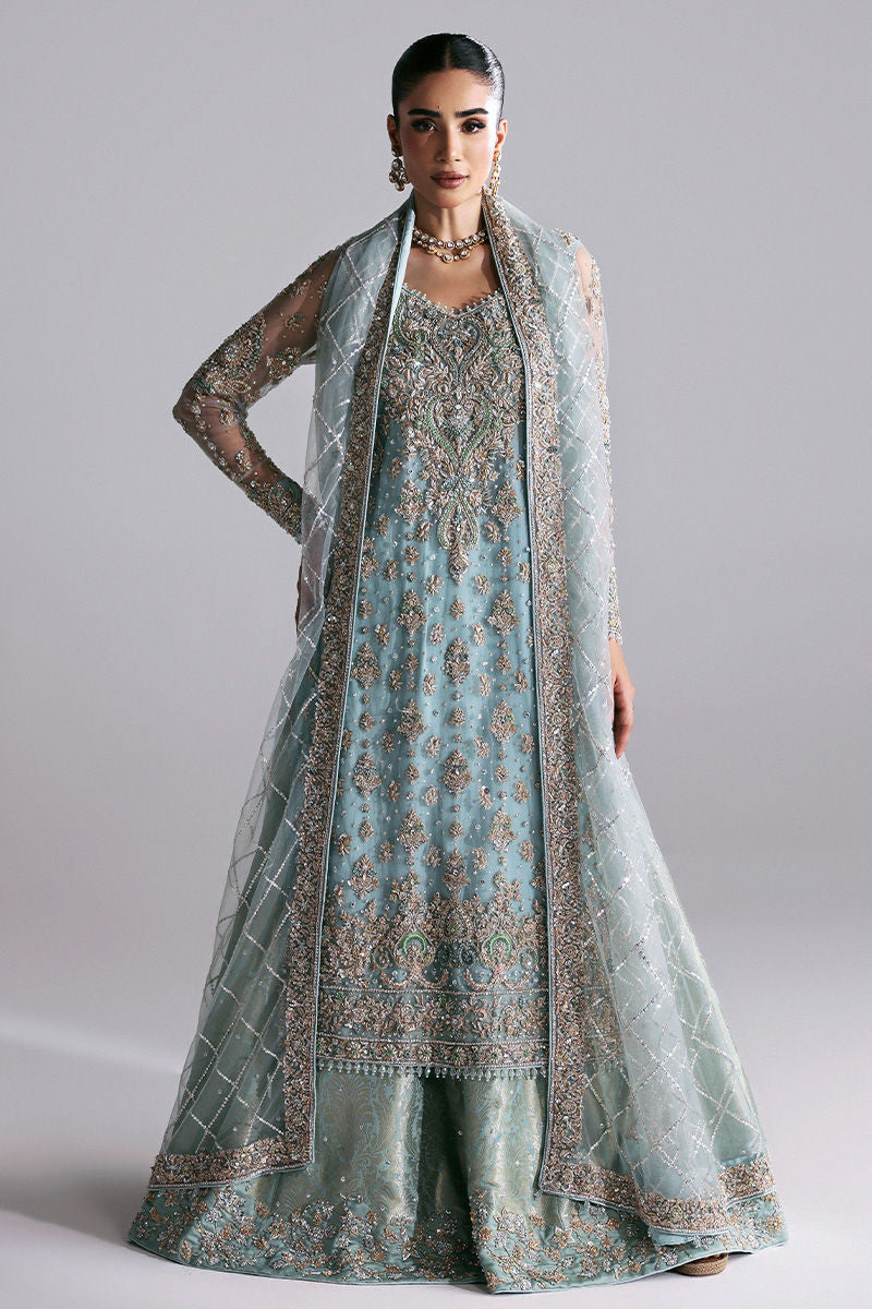 Zayra, made by MAIRAZ — full-length front view of the aqua shirt, sharara and net dupatta