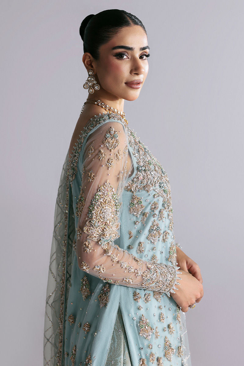 Zayra, made by MAIRAZ — side portrait showing embellished net sleeves
