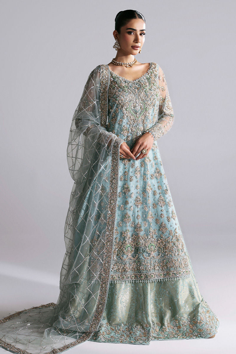 Zayra, made by MAIRAZ — full-length angled view showing the spread dupatta and sharara hem