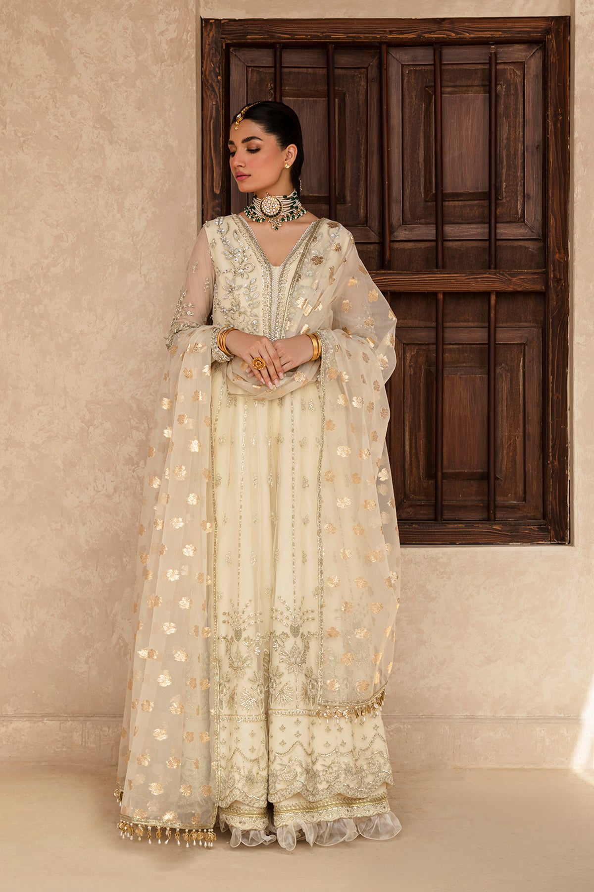 Raniya ivory lehenga ensemble, reference outfit photograph 1 — Made by Mairaz reproduction