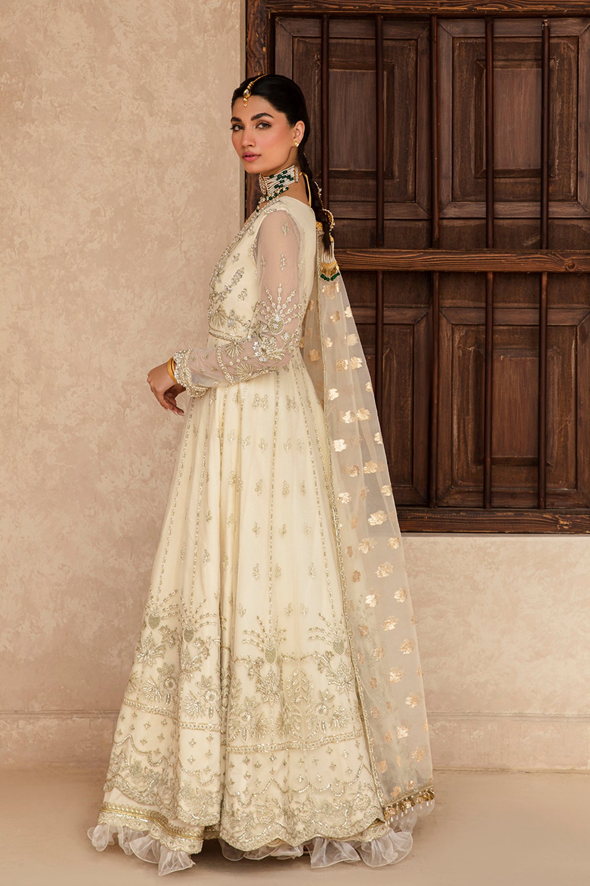 Raniya ivory lehenga ensemble, reference outfit photograph 2 — Made by Mairaz reproduction