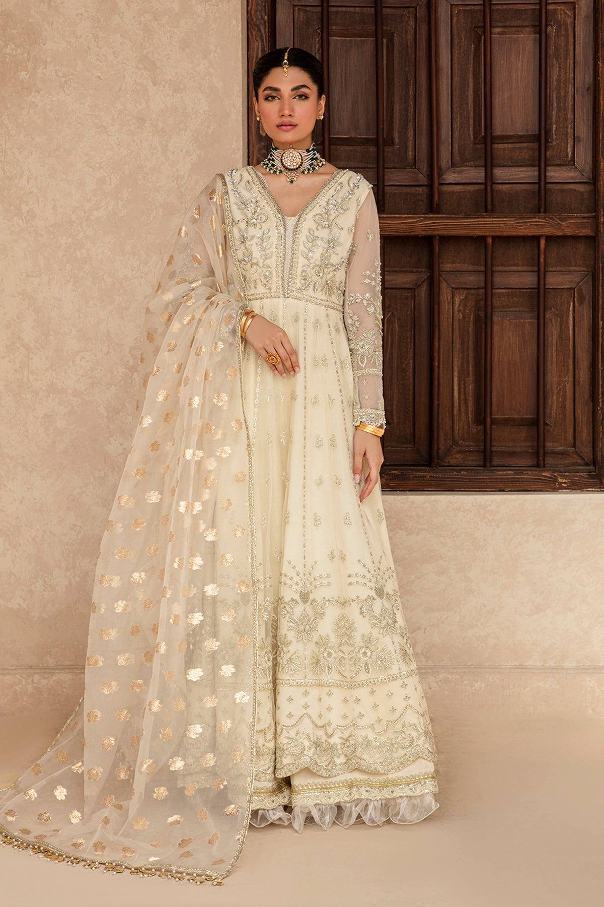 Raniya ivory lehenga ensemble, reference outfit photograph 3 — Made by Mairaz reproduction