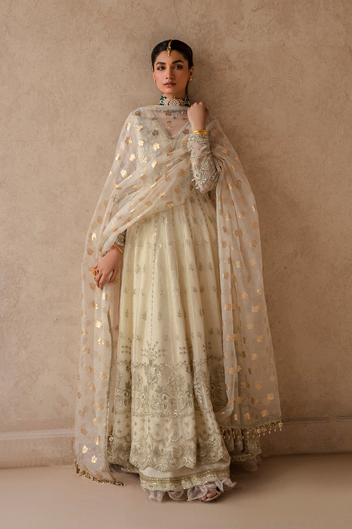 Raniya ivory lehenga ensemble, reference outfit photograph 4 — Made by Mairaz reproduction