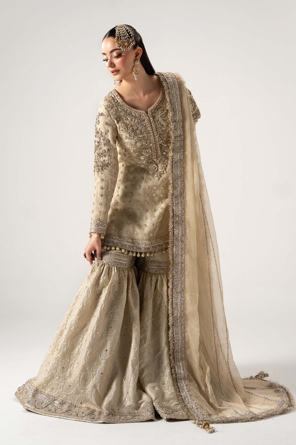 Maria B Mayrozeh Style gold gharara full length pose