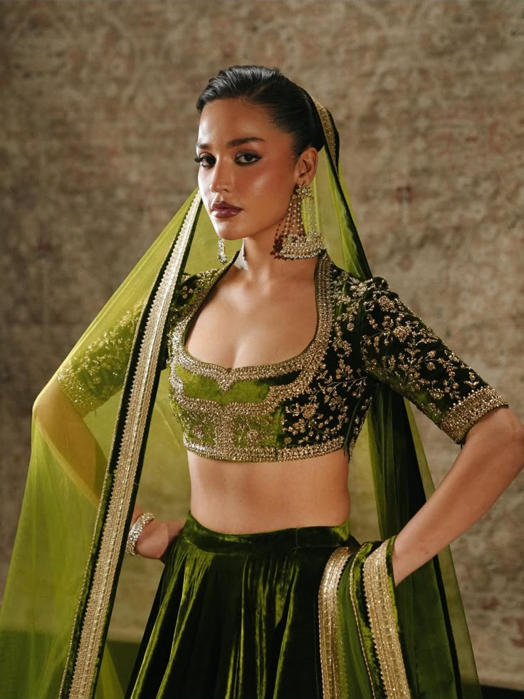 Olive Noor Velvet by MAIRAZ — front bodice view showing embroidered sleeves and dupatta border; design reference