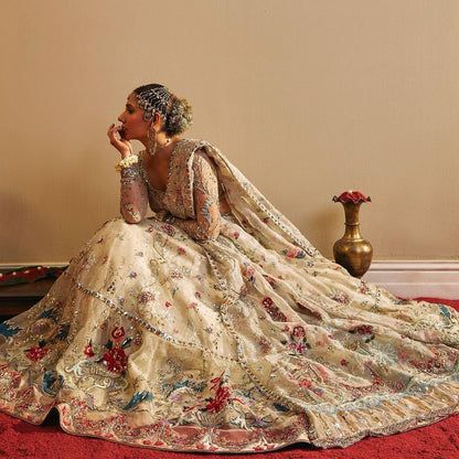 RANO ivory floral bridal lehenga, seated view