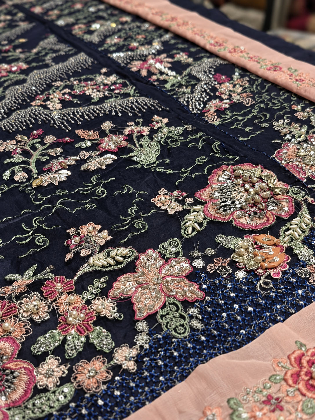 Republic Womenswear Stella Style angled close-up of navy embroidery and beadwork