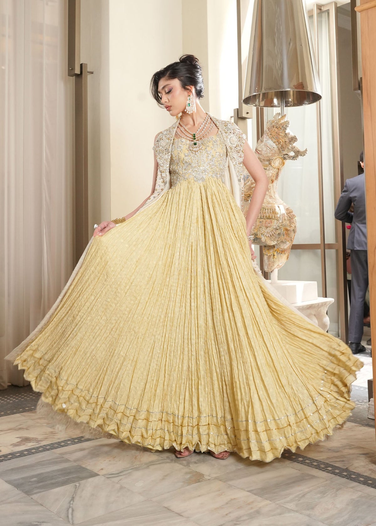 Saira Shakira Lunaire design reference — crushed lime-yellow skirt spread and embellished bodice