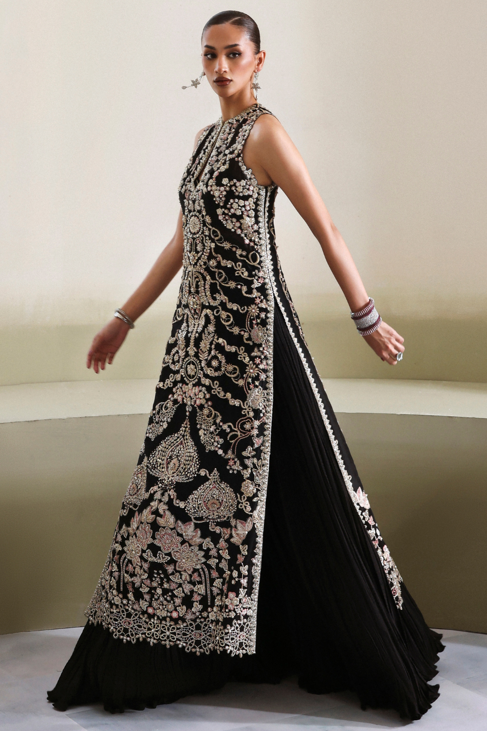 Soraya Myrren reference image — black formal ensemble, detail view