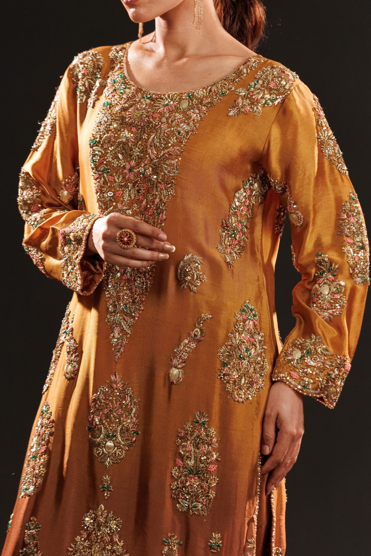 Usama Silk Amber Royale amber-gold formal — neckline and sleeve embroidery, source design reference