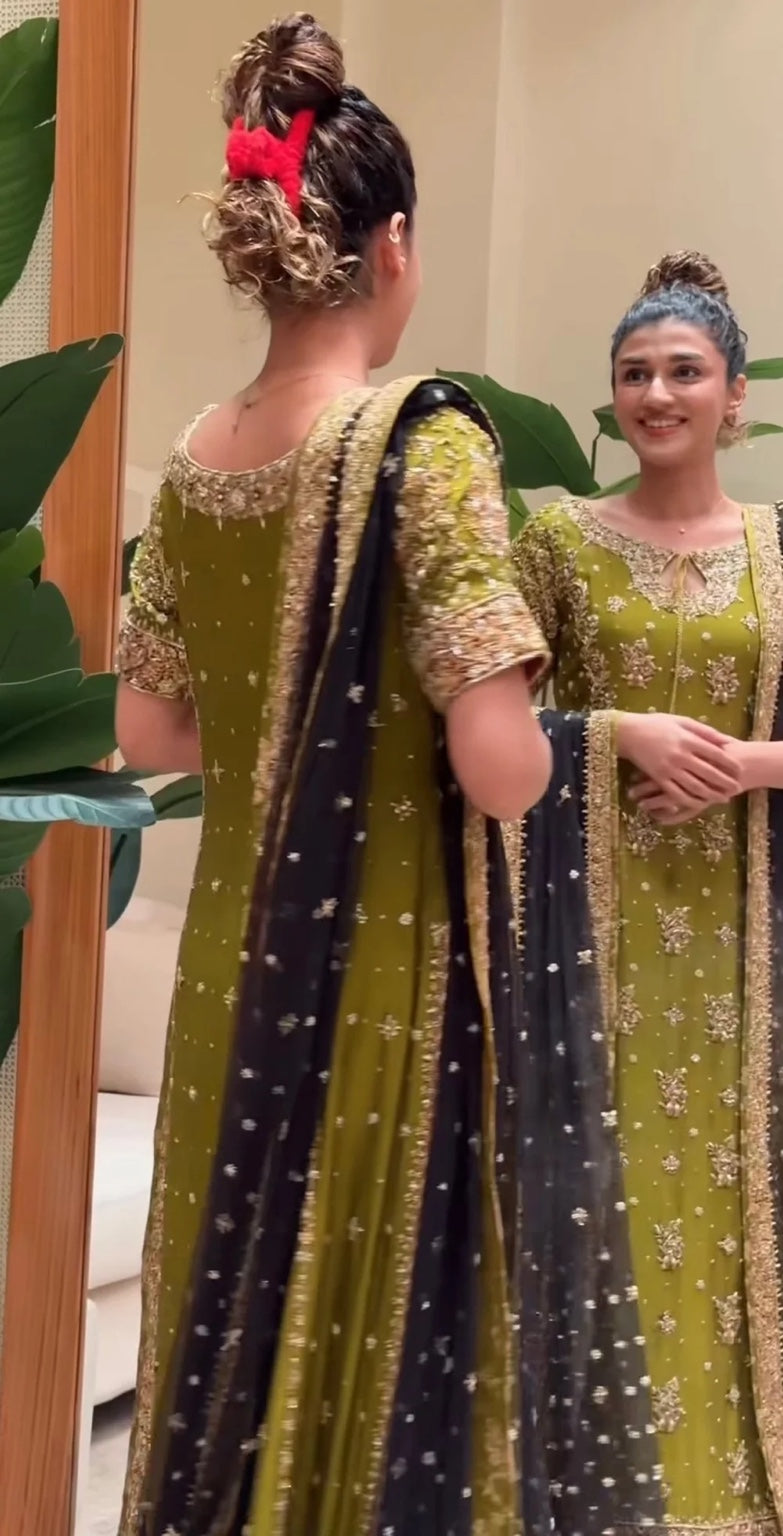 Zeeshan Danish Rehma Style back view with olive green shirt and black embellished dupatta