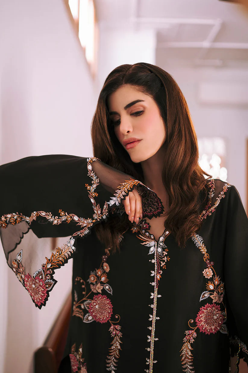 Zona Shaham Elle Style black embroidered sleeve and neckline detail